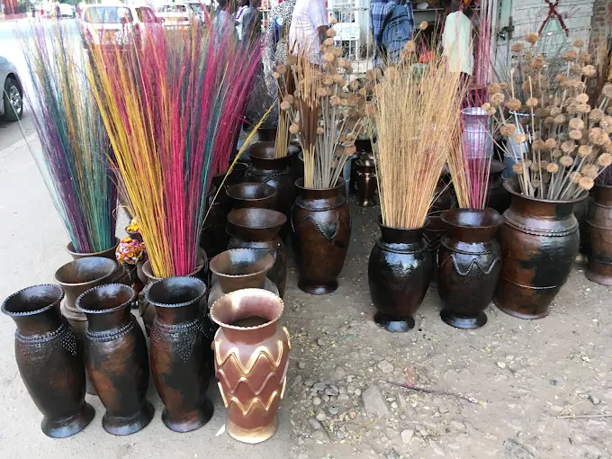 People walking through Bujumbura City Market